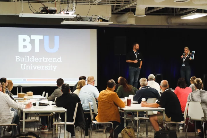 BTU in session with speakers on stage