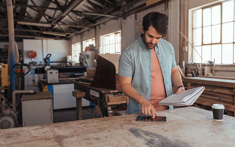 Builder with mobile device and notebook