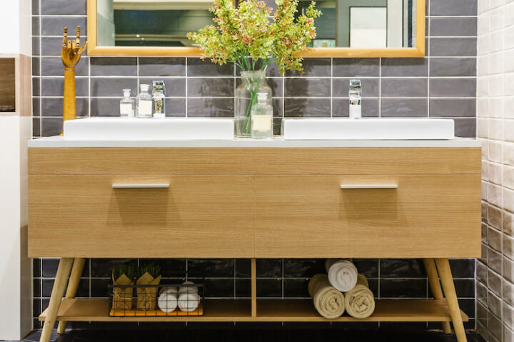 Modern bathroom sink with wooden drawers