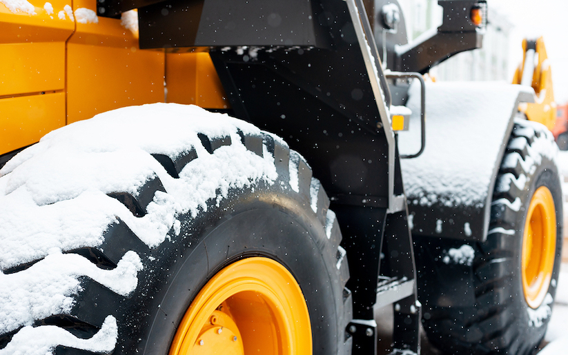 Snow covered tractor