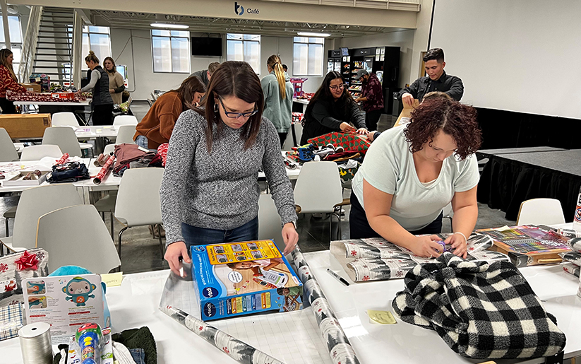 Wrapping presents for Adopt a Family