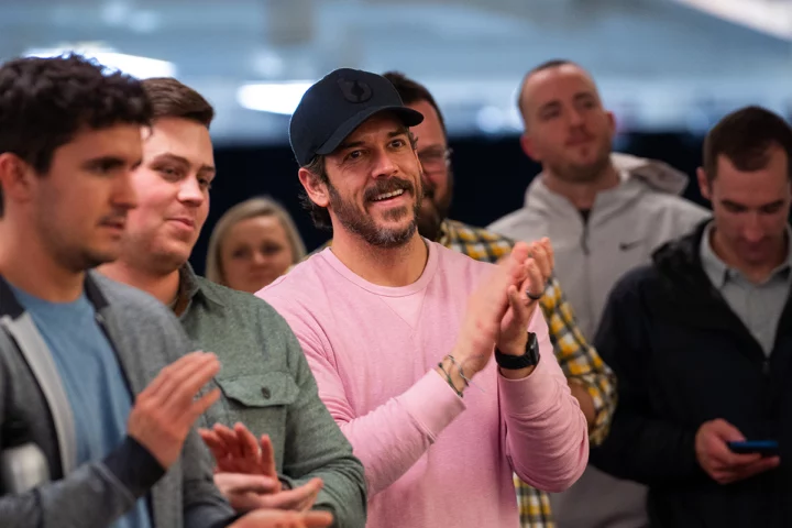 Group of people applauding happily