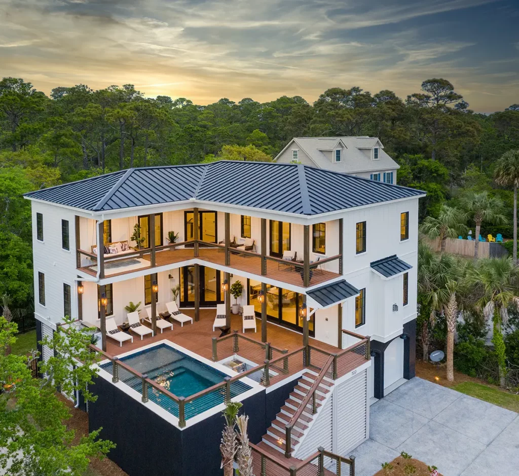 Home surrounded by trees with outdoor pool