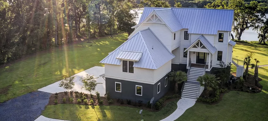zoomed out photo taken from drone of multi story house