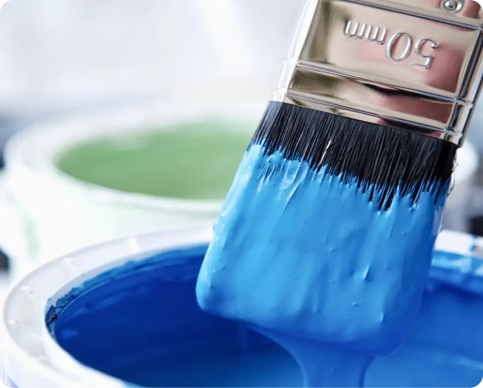 Blue paint with brush