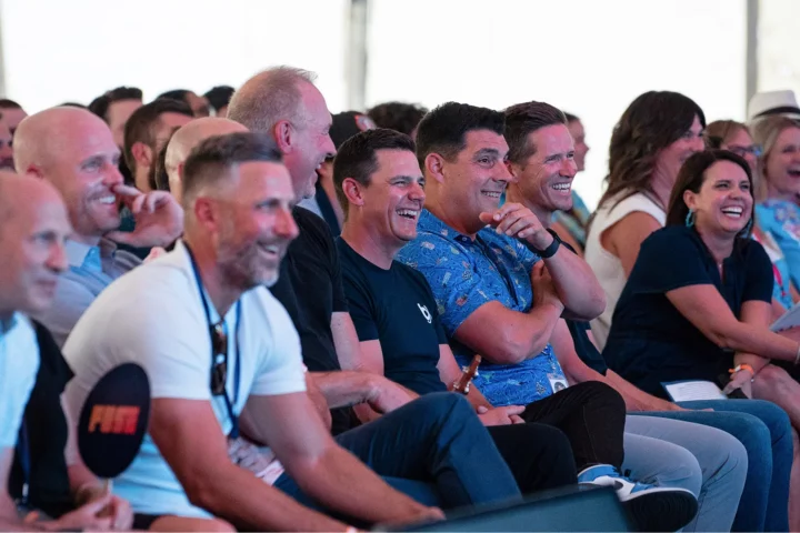 Buildertrend Executive team smiling during Buildertrend 2024 FUSE meeting