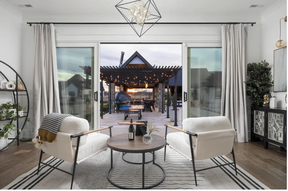 Interior living room photo looking outside through sliding glass door.