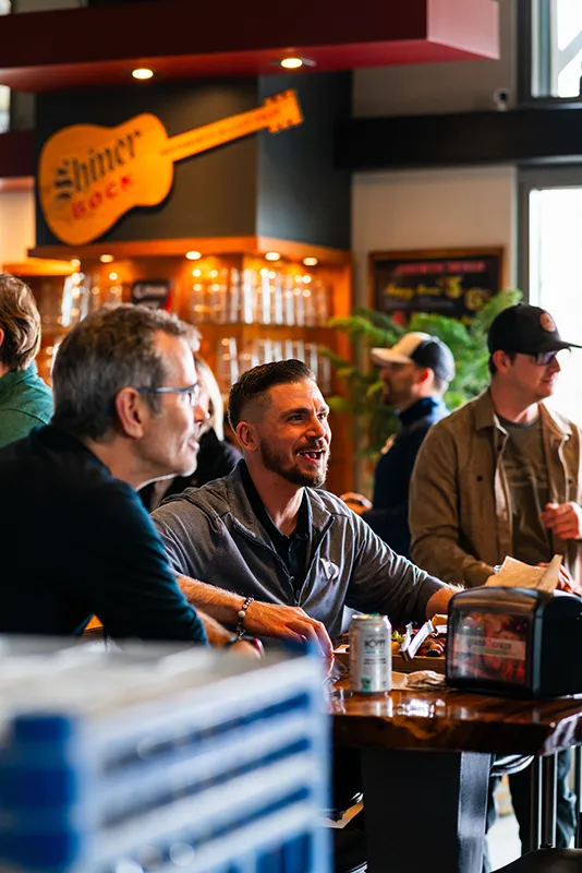 Men sitting at a bar