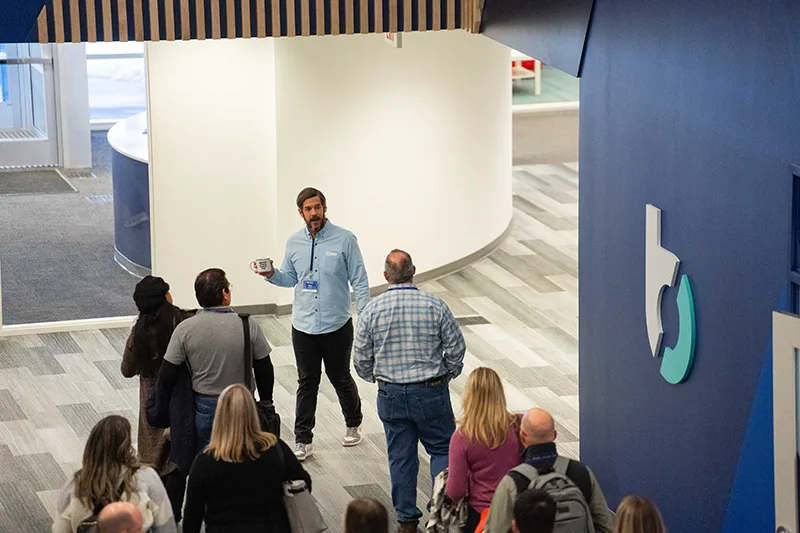 Group of BTU attendees participating in Buildertrend building tour