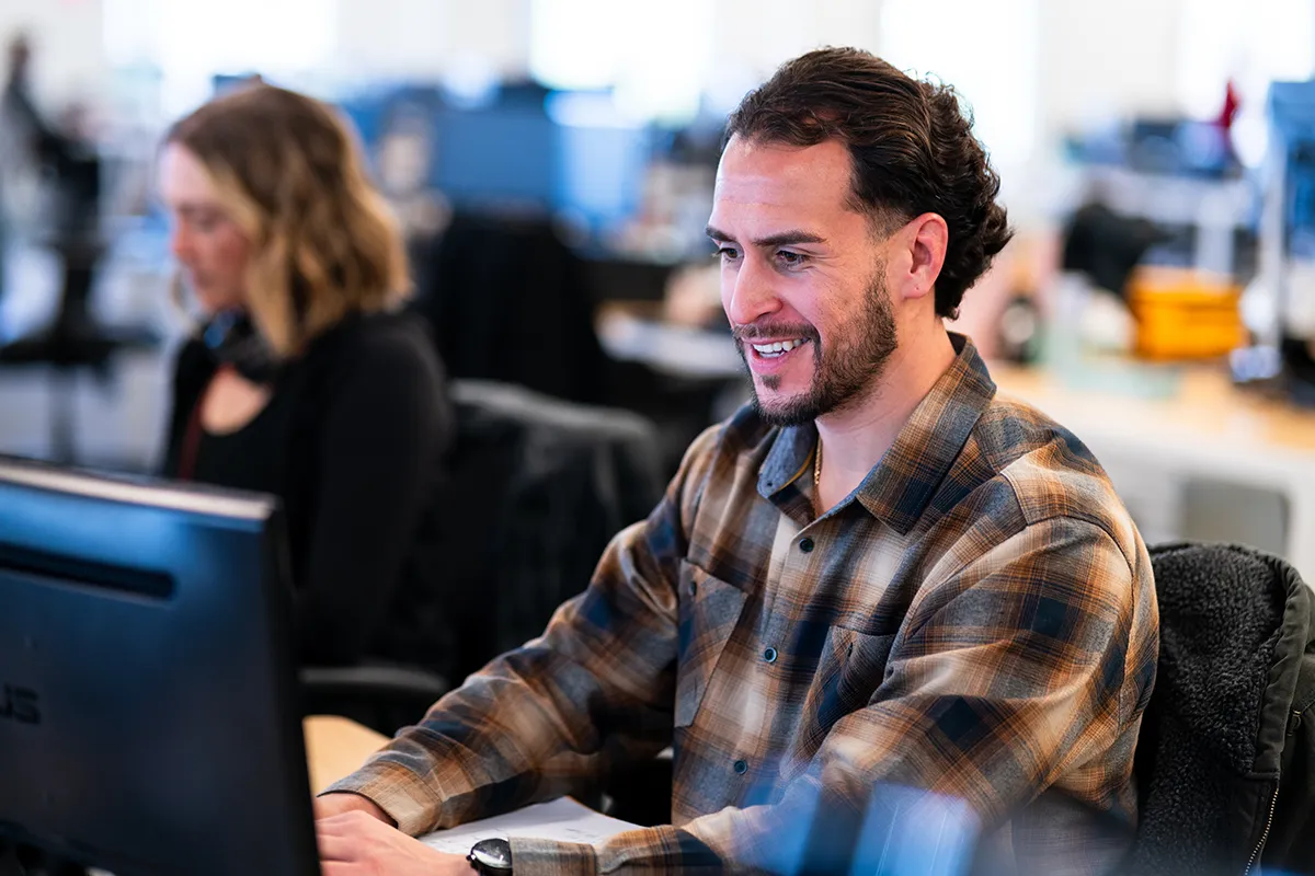 Man sitting in front of computer working