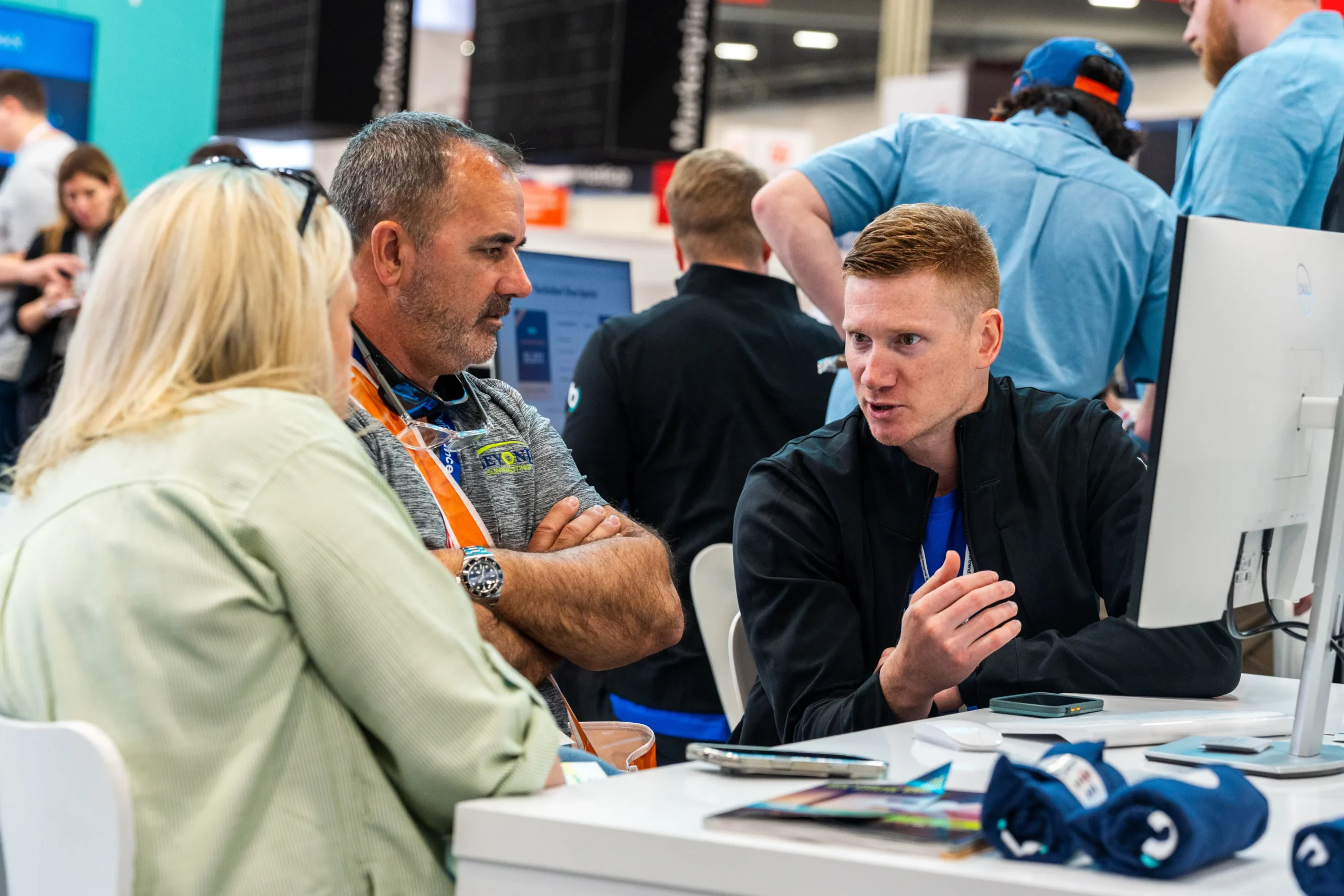 IBS 2025 team members looking at computer