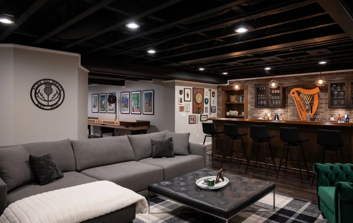 Finished basement with bar and living room