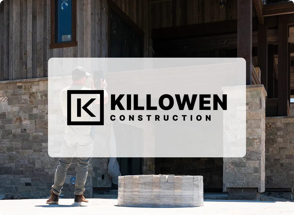 Killowen Construction logo with exterior home photograph 