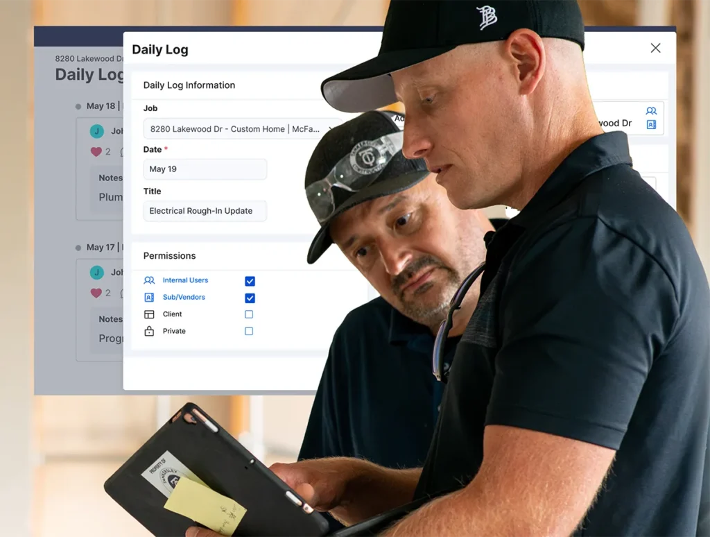 Two men reviewing daily logs on tablet