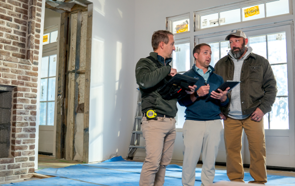 CopeGrand Homes team in a construction site