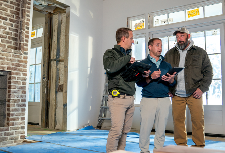 CopeGrand Homes team in a construction site